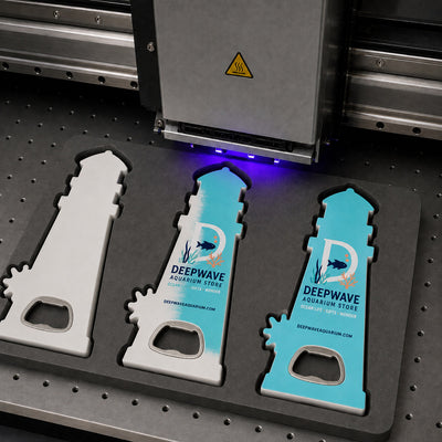 Aquarium Gift Shop custom logo bottle opener magnet - close-up of the UV printed logo