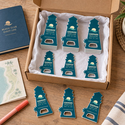 Beach Club custom logo bottle opener magnet - bulk order laid out before packing