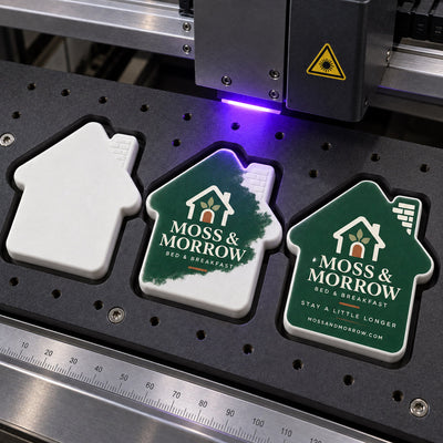 Bed and Breakfast custom logo bottle opener magnet - close-up of the UV printed logo
