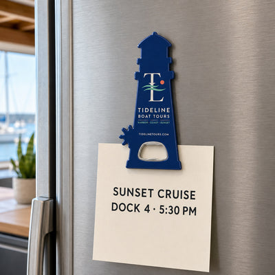 Boat Tour custom logo bottle opener magnet - held on a refrigerator door by its magnetic back