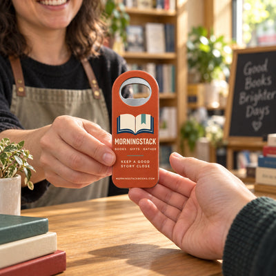 Bookstore custom logo bottle opener magnet - handed to a customer