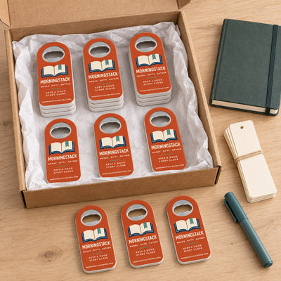 Bookstore custom logo bottle opener magnet - bulk order laid out before packing
