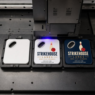 Bowling Alley custom logo bottle opener magnet - close-up of the UV printed logo