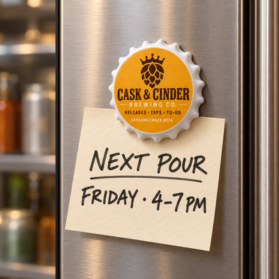 Branded Brewery custom logo bottle opener magnet - held on a refrigerator door by its magnetic back