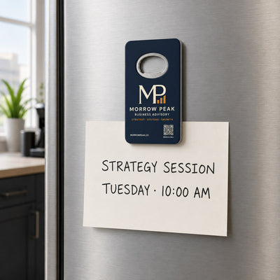 Business Consultant custom logo bottle opener magnet - held on a refrigerator door by its magnetic back