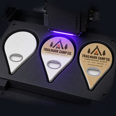 Campground Souvenir custom logo bottle opener magnet - close-up of the UV printed logo