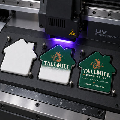 Cider House custom logo bottle opener magnet - close-up of the UV printed logo