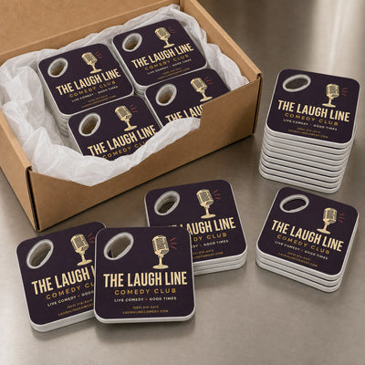 Comedy Club custom logo bottle opener magnet - bulk order laid out before packing