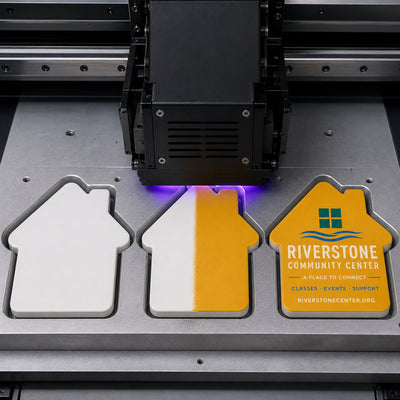 Community Center custom logo bottle opener magnet - close-up of the UV printed logo