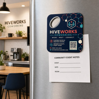 Coworking Space custom logo bottle opener magnet - held on a refrigerator door by its magnetic back