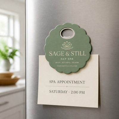 Day Spa custom logo bottle opener magnet - held on a refrigerator door by its magnetic back