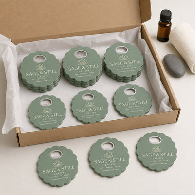 Day Spa custom logo bottle opener magnet - bulk order laid out before packing