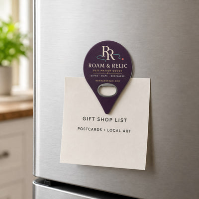 Destination Gift Shop custom logo bottle opener magnet - held on a refrigerator door by its magnetic back