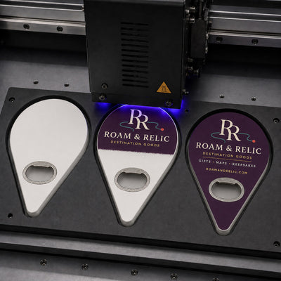 Destination Gift Shop custom logo bottle opener magnet - close-up of the UV printed logo