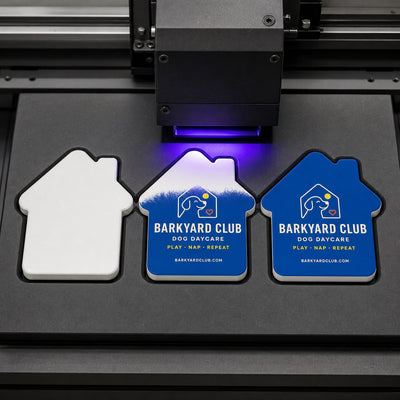 Dog Daycare custom logo bottle opener magnet - close-up of the UV printed logo