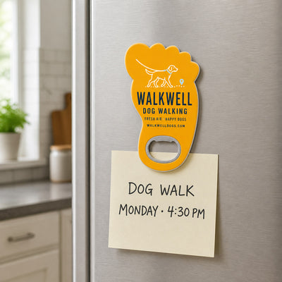 Dog Walker custom logo bottle opener magnet - kept on a refrigerator door as a reminder