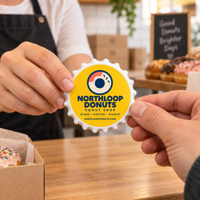 Donut Shop custom logo bottle opener magnet - handed to a customer