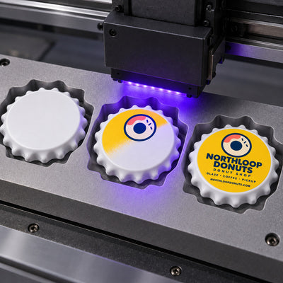 Donut Shop custom logo bottle opener magnet - close-up of the UV printed logo