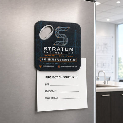 Engineering Company custom logo bottle opener magnet - held on a refrigerator door by its magnetic back