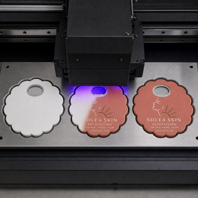 Esthetician custom logo bottle opener magnet - close-up of the UV printed logo