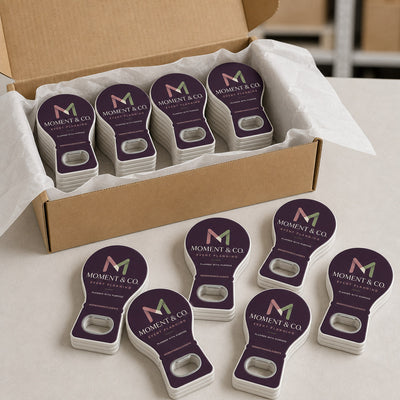 Event Planner custom logo bottle opener magnet - bulk order laid out before packing