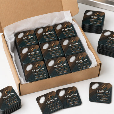 Flooring Company custom logo bottle opener magnet - bulk order laid out before packing