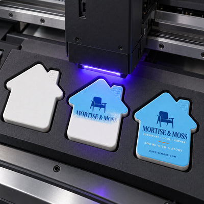 Furniture Store custom logo bottle opener magnet - close-up of the UV printed logo