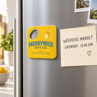 Gift Shop custom logo bottle opener magnet - held on a refrigerator door by its magnetic back