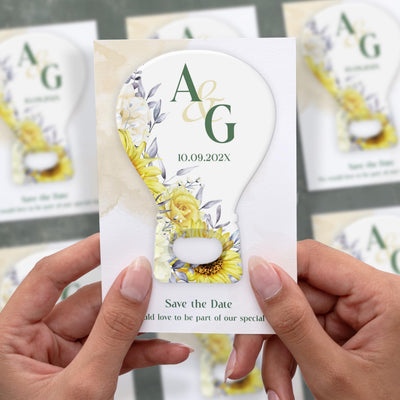 Rustic Sunflower save the date bottle opener magnet shown in hand on its printed background card
