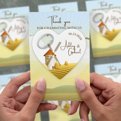 Heart wedding bottle opener magnet shown in hand on its printed background card