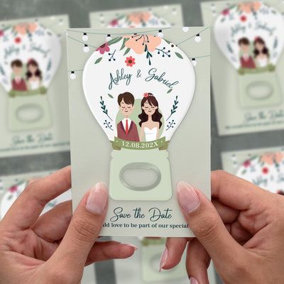 Hot Air Balloon Couple Illustration save the date bottle opener magnet shown in hand on its printed background card