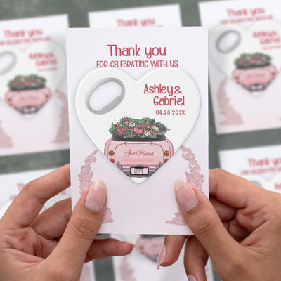 Heart Shape Pink Car wedding bottle opener magnet shown in hand on its printed background card