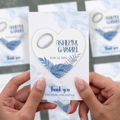 Tropical Leaf Summer wedding bottle opener magnet shown in hand on its printed background card