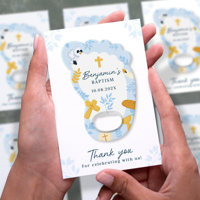 Blue Footprint Boy baptism bottle opener magnet shown in hand on its printed background card