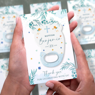 Blue Floral Angel baptism bottle opener magnet shown in hand on its printed background card