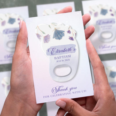 Footprint Floral baptism bottle opener magnet shown in hand on its printed background card