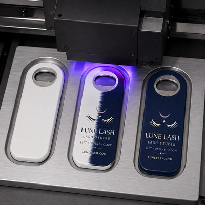 Lash Studio custom logo bottle opener magnet - close-up of the UV printed logo