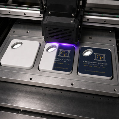 Law Firm custom logo bottle opener magnet - close-up of the UV printed logo