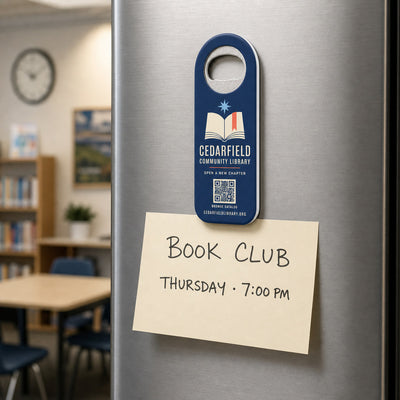 Library custom logo bottle opener magnet - kept on a refrigerator door as a reminder