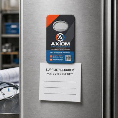 Manufacturer custom logo bottle opener magnet - held on a refrigerator door by its magnetic back