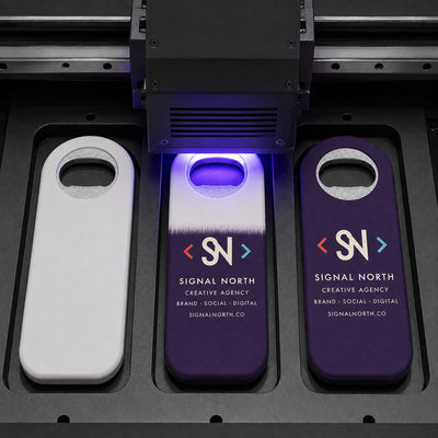Marketing Agency custom logo bottle opener magnet - close-up of the UV printed logo