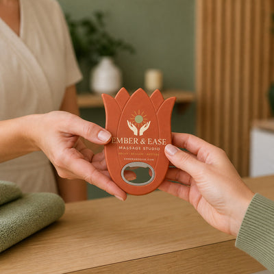 Massage Studio custom logo bottle opener magnet - handed to a customer