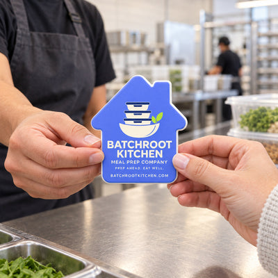 Meal Prep Company custom logo bottle opener magnet - handed to a customer