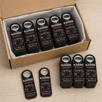 Motorcycle Dealer custom logo bottle opener magnet - bulk order laid out before packing