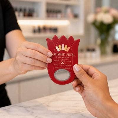 Nail Salon custom logo bottle opener magnet - handed to a customer