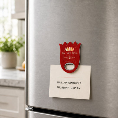 Nail Salon custom logo bottle opener magnet - held on a refrigerator door by its magnetic back