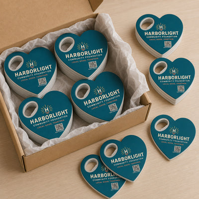 Nonprofit Event custom logo bottle opener magnet - bulk order laid out before packing