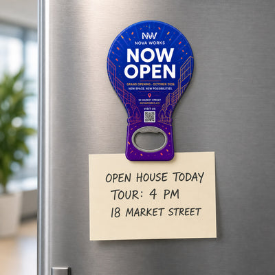 Office Grand Opening custom logo bottle opener magnet - held on a refrigerator door by its magnetic back