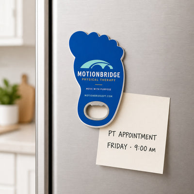 Physical Therapy Clinic custom logo bottle opener magnet - held on a refrigerator door by its magnetic back