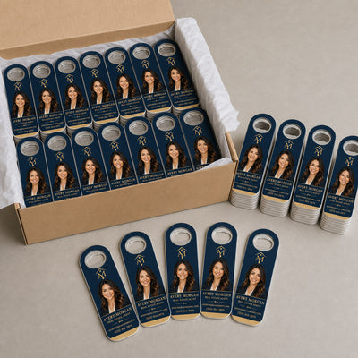 Real Estate Agent custom logo bottle opener magnet - bulk order laid out before packing